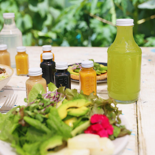 Fresh fruit and bottles of elixers
