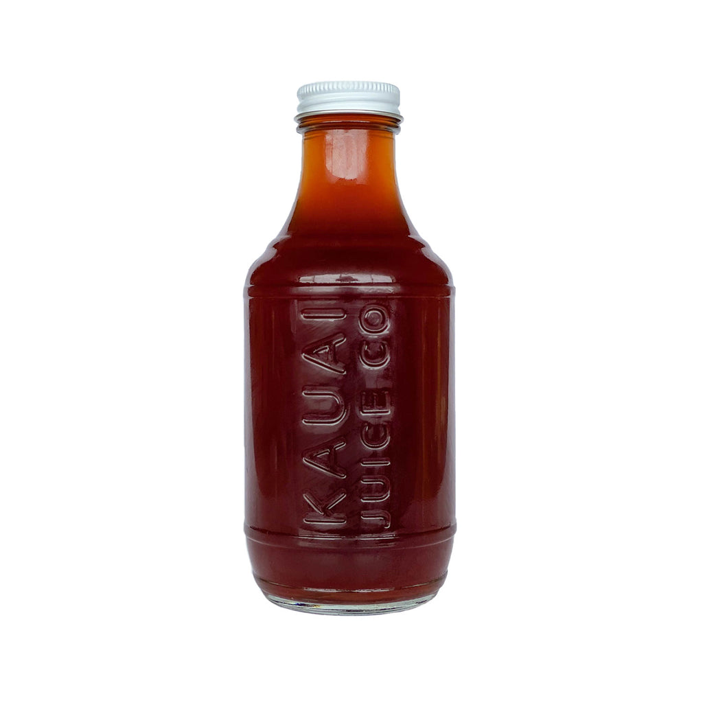 bottle of red juice in Kauai Juice Co bottle