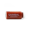 Bottle of red Sambal sauce by Kauai Juice Co