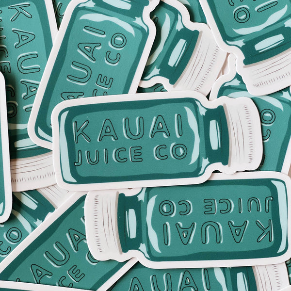 pile of hand drawn Kauai Juice Co jar stickers