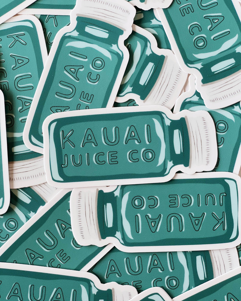 pile of hand drawn Kauai Juice Co jar stickers